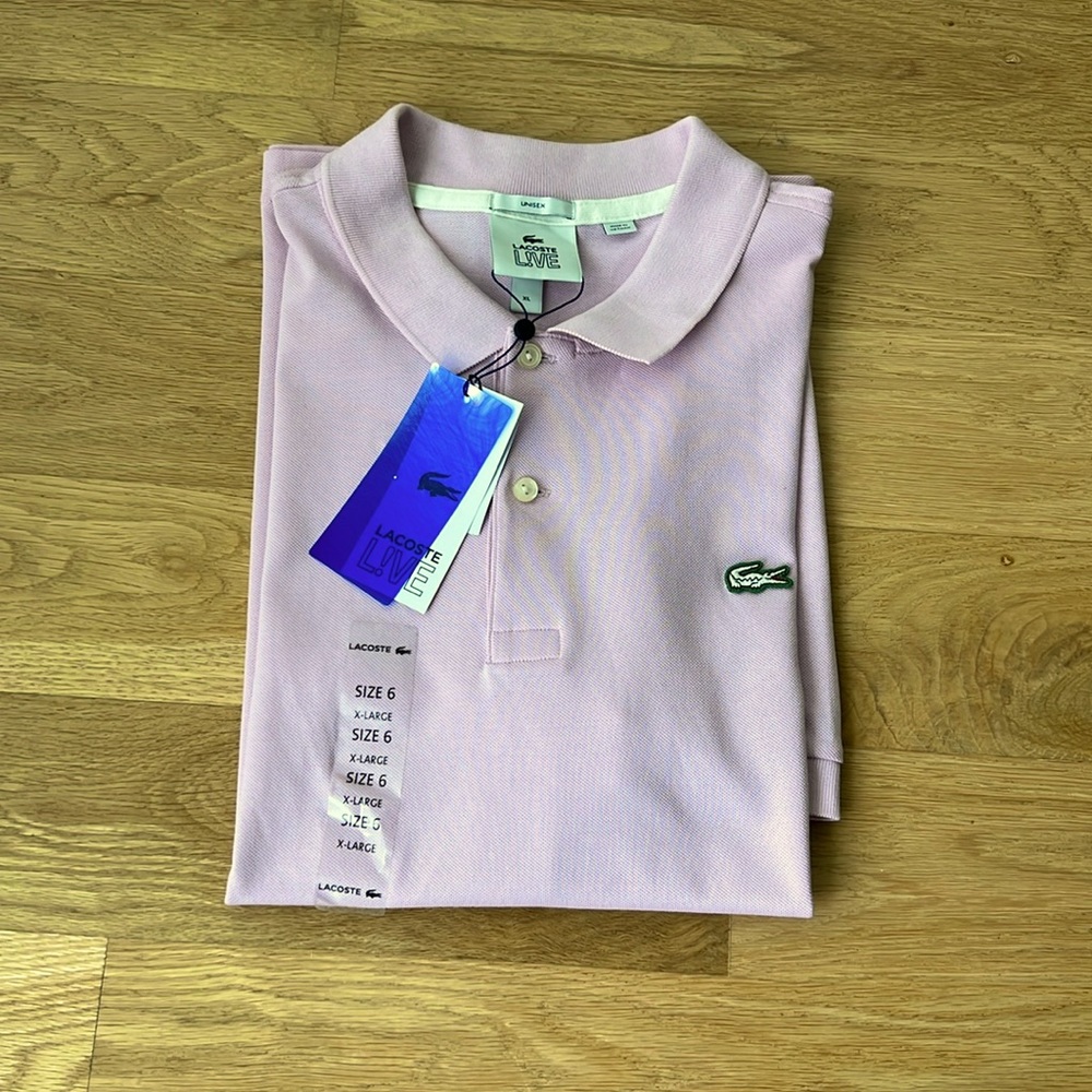 NWT Authentic Lacoste unisex polo. Size 6 (XL). Short sleeve. Pink. 100% Cotton.